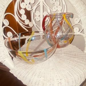 Vintage colorful glass serving bowl and pitcher set.